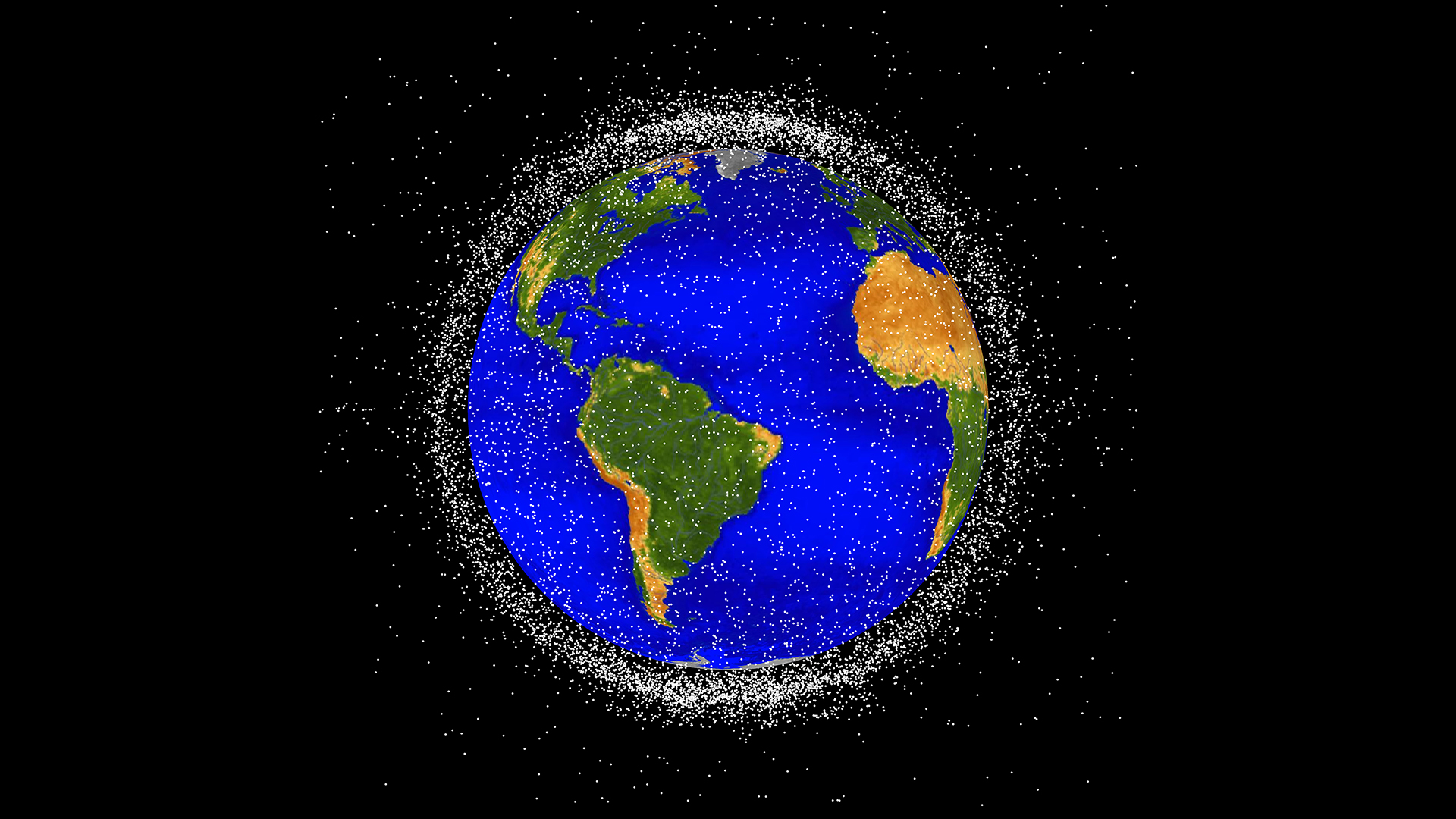 The space junk appears as many small white points surrounding Earth, which has bright blue oceans and green and brown continents. The space junk is thick enough to form a cloud that obscures most of the black background when viewed from the edges around Earth.