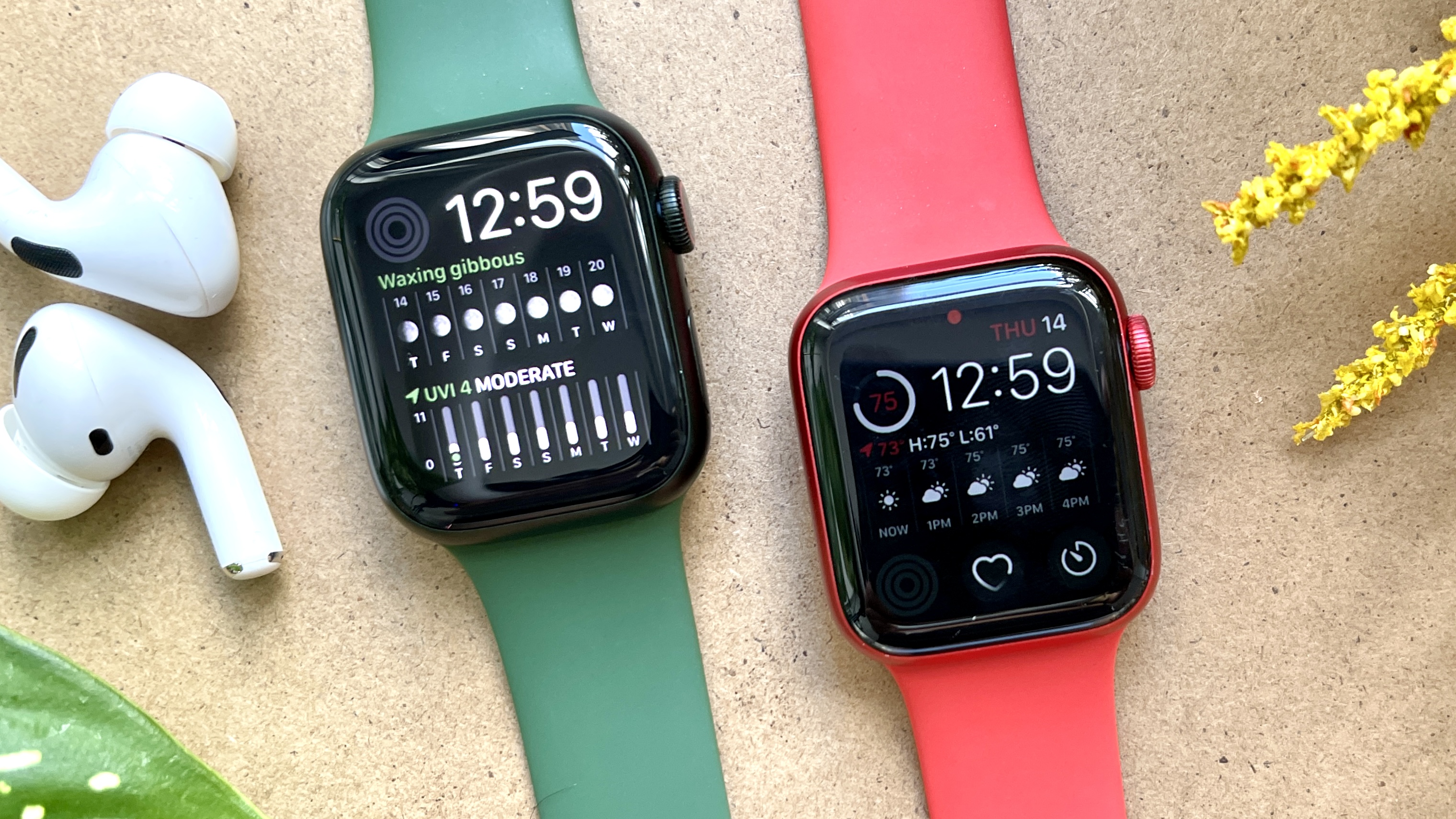 apple watch series 7 (left) and apple watch series 6 (right) laying on a table