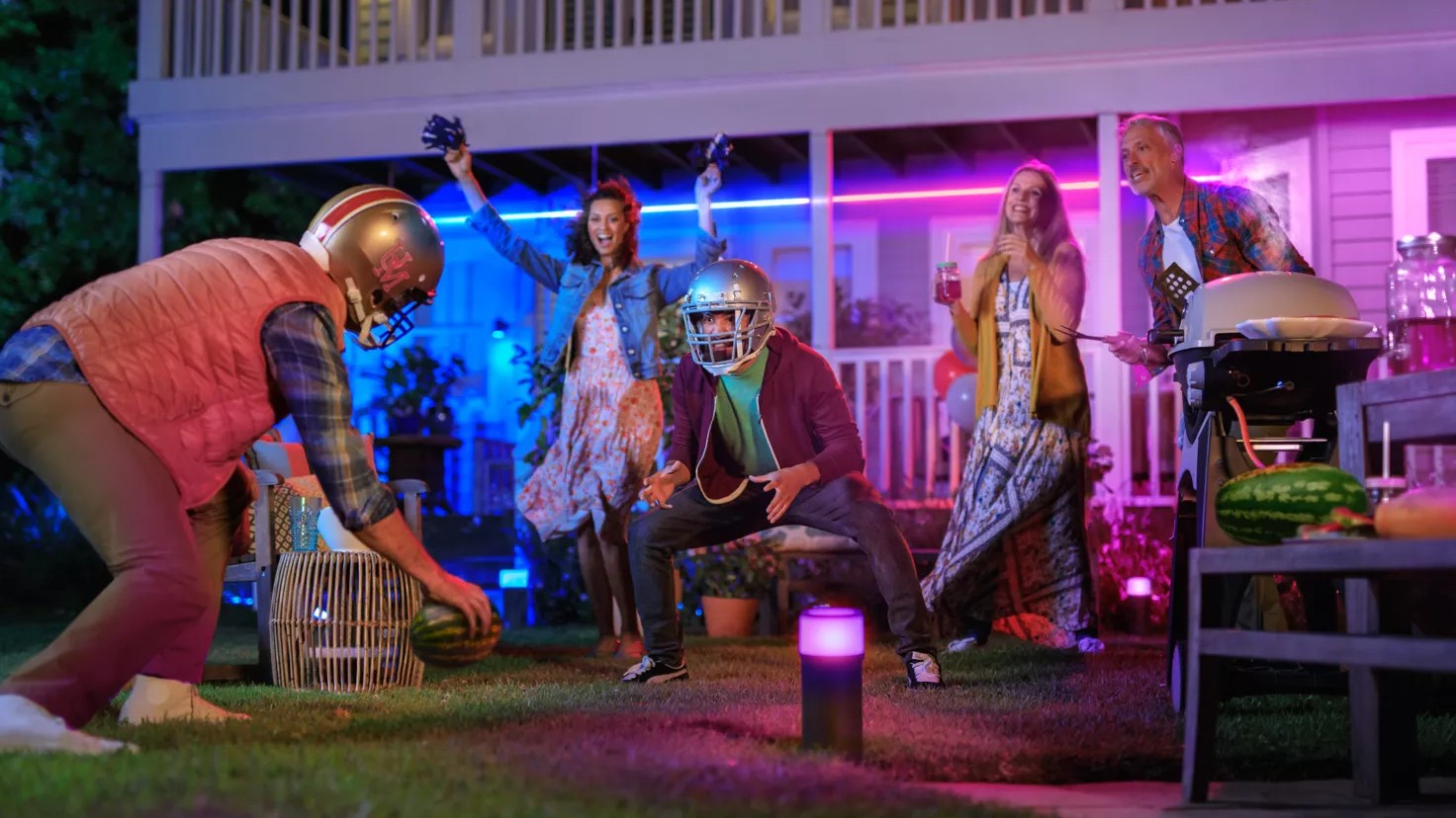 People at a party outside with Philips Hue lights