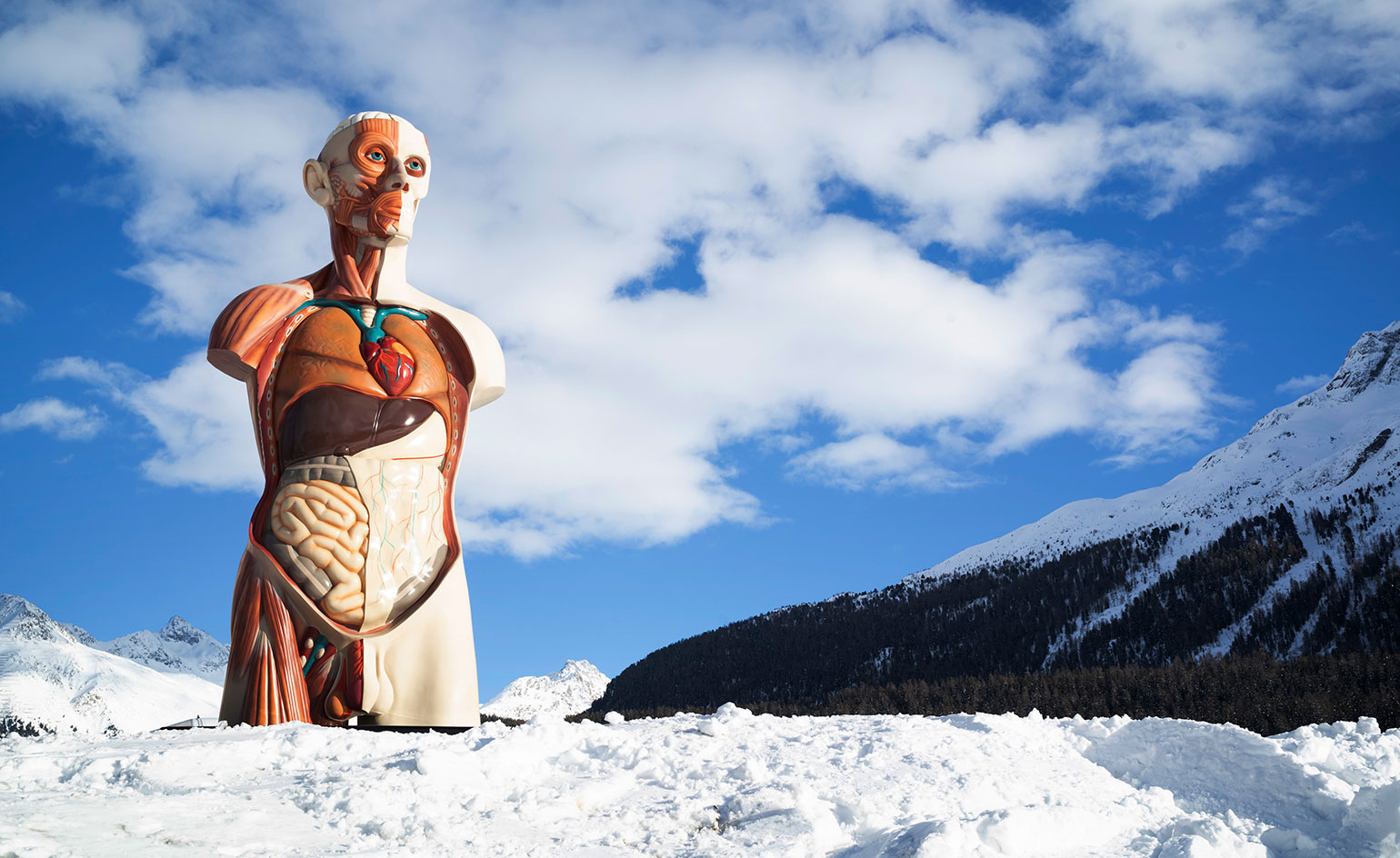 Photograph of Damien Hirst's Temple sculpture being installed on Lake St Moritz