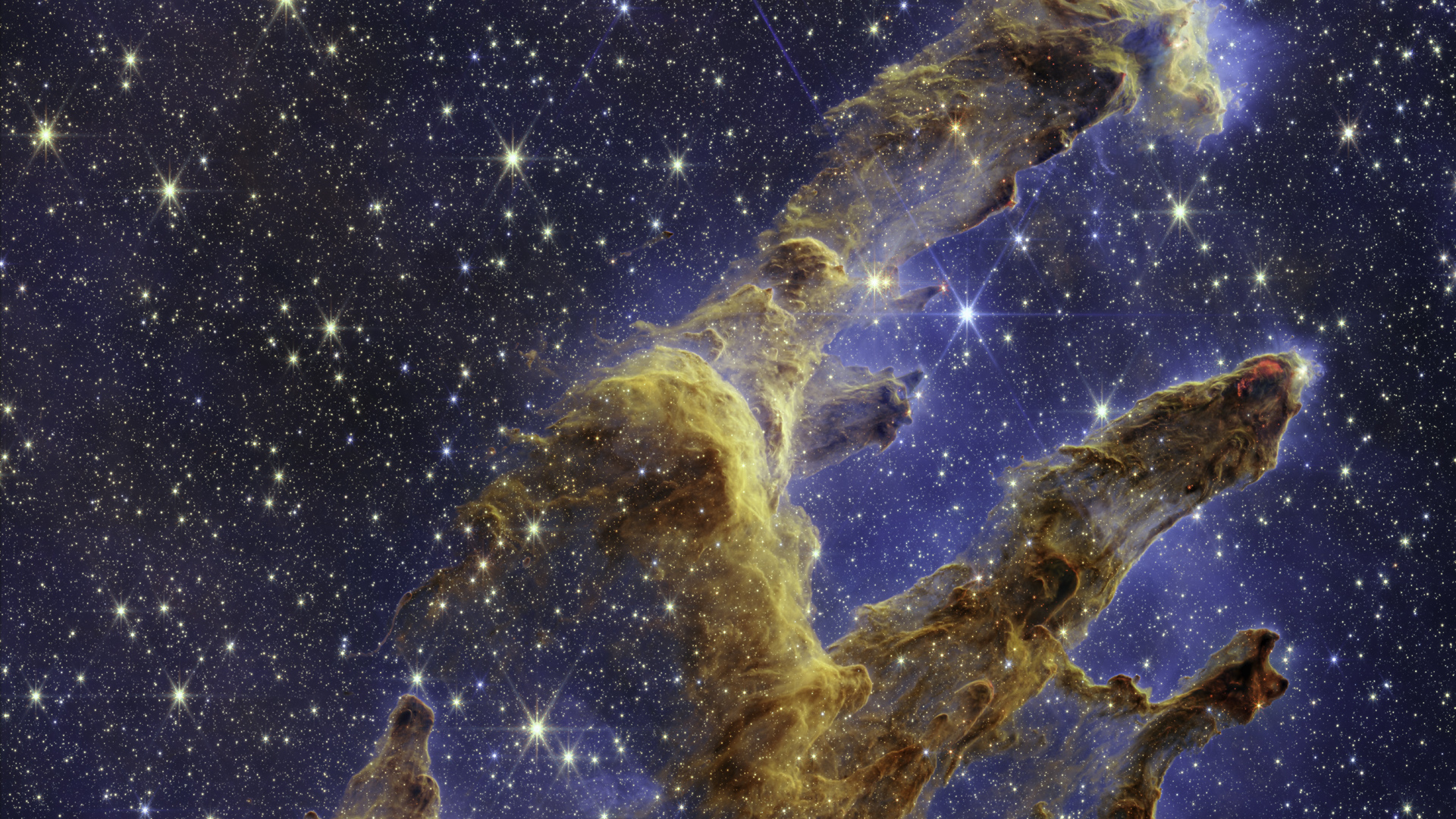 The James Webb Space Telescope&#039;s view of the iconic Pillars of Creation is full of sparkling new-born stars.