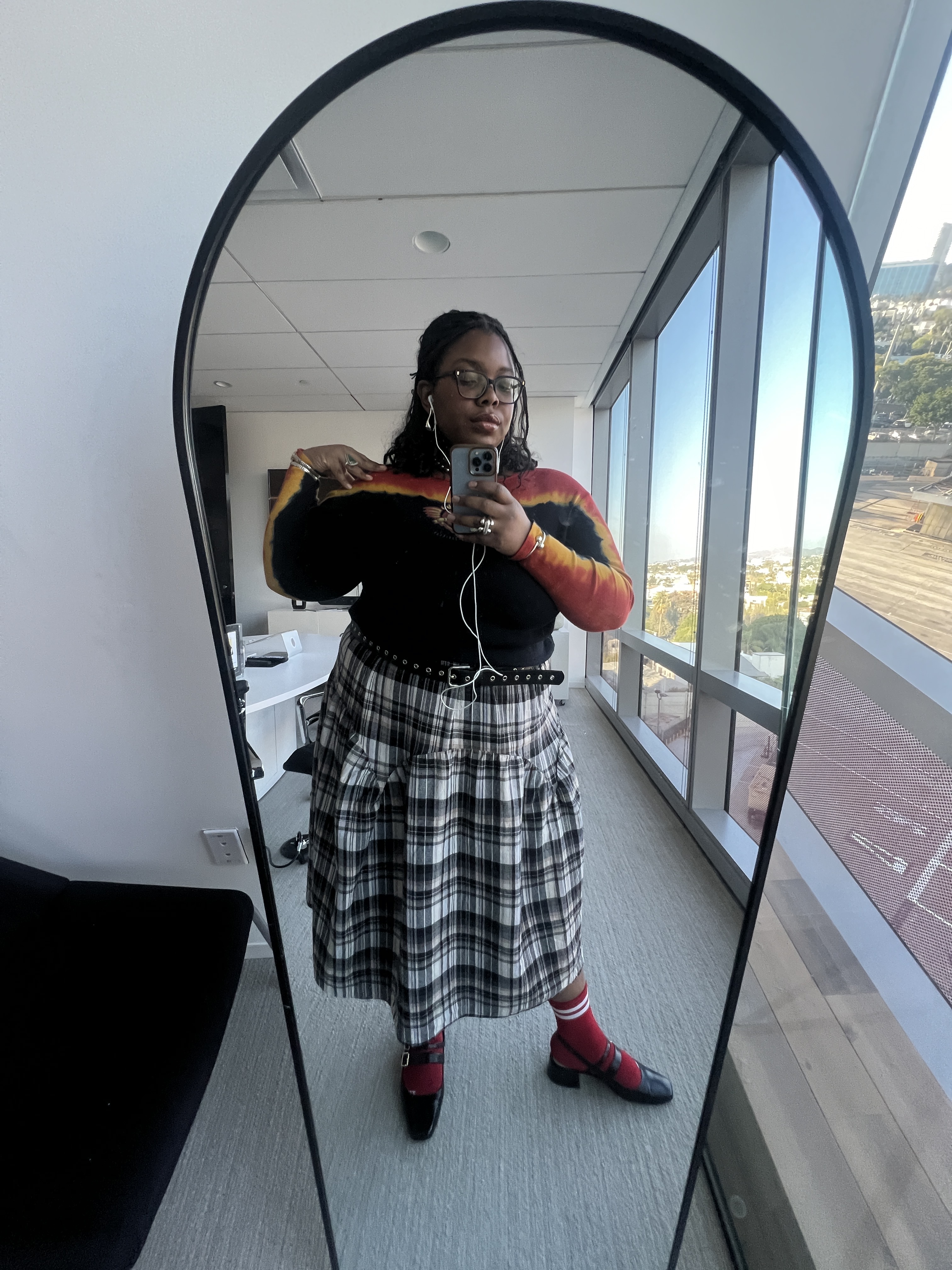 Chinazor Offor wearing Dolce Vita black slingback heels.