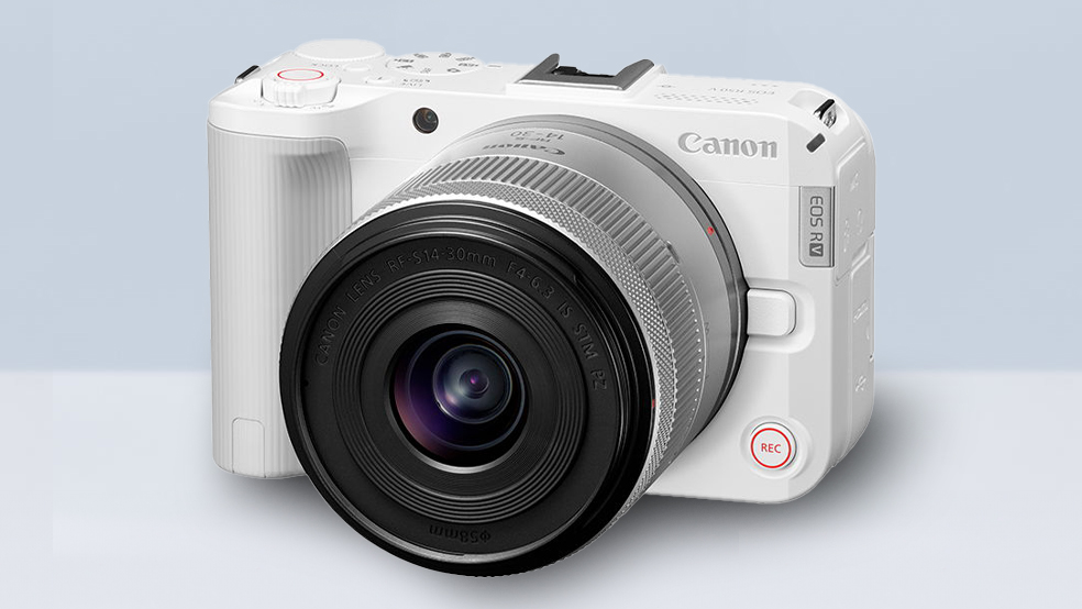 Canon EOS R50 V in white, against a blue and grey background